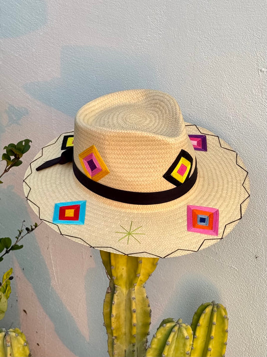 San Jose Sunhat with colorful patches and a black ribbon.